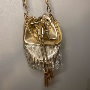 Gold crossbody purse with jewels